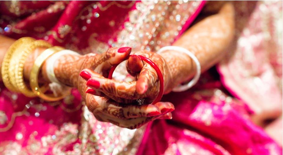Cultural significance of Shakha Pola worn by a bengali bride-to-be